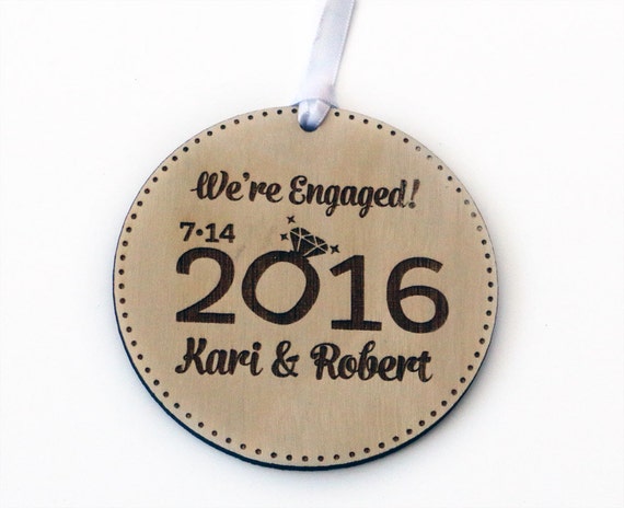 personalized we re engaged christmas ornament our first personalized we re engaged christmas ornament our first