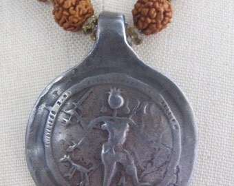 Antique Indian Silver Shiva Amulet with Star Fossil and Rudraksha Beads