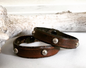 Brown leather bracelet with silver spots, studs