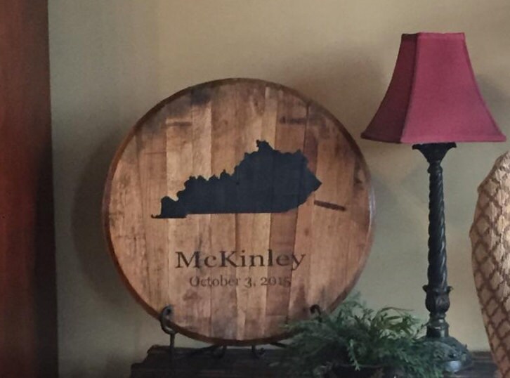 Custom bourbon barrel head with State of Kentucky and Last