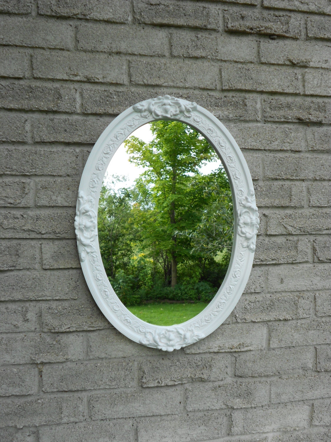 White frame oval mirror. bathroom mirror dresservanity