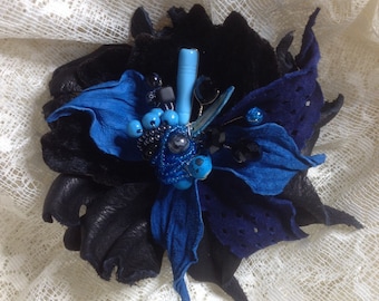 Brooch, hair accessories made of leather
