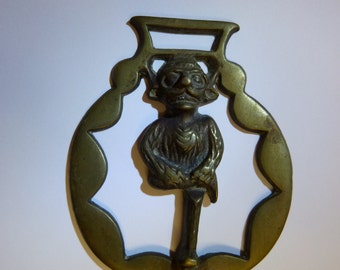 Vintage solid horse brass with unusual goggled steampunk pixie motif