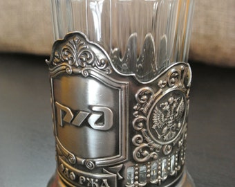 Tea cup glass holder. Emblem RZD, Russian Railways and faceted glass. In the style of the period of the Soviet Union. USSR