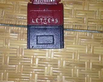 Cast iron postal mailbox bank
