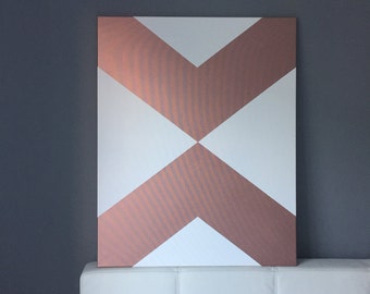 Rosé gold, geometric arrows on screen
