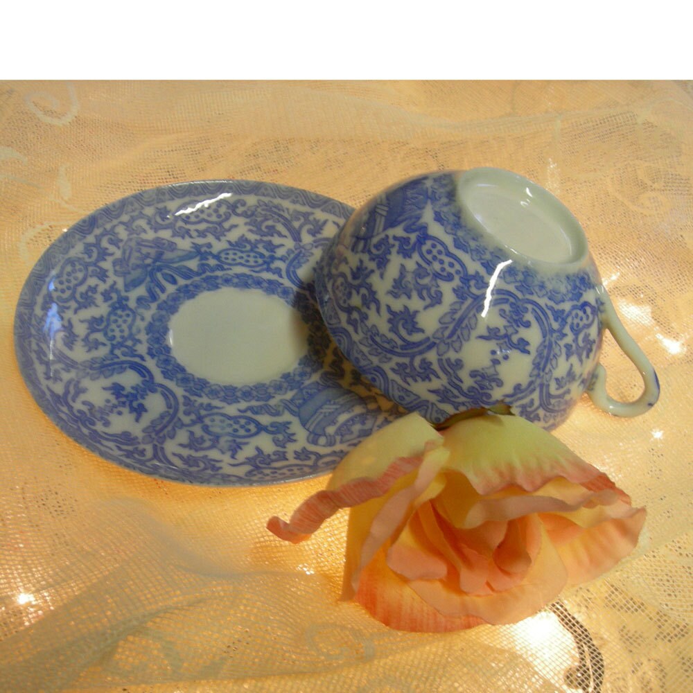 Vintage Blue and White Porcelain Tea Cup and Saucer