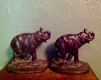 Connecticut Foundry iron works cast iron elephant book ends trunk up bookends