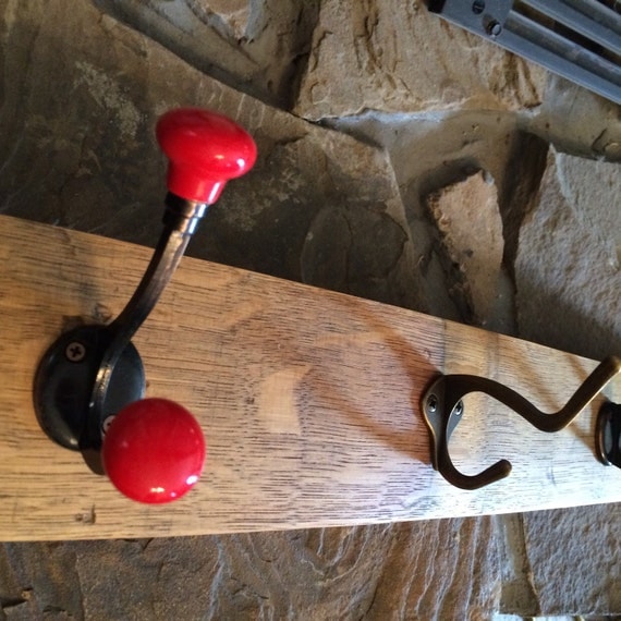 Wall coat rack with red ceramic knobs on a by RepurposedbyReali