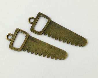 2 saw charms bronze tone , 57mm # CH 085