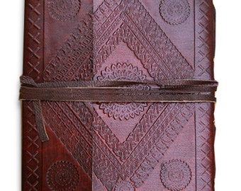 Handmade leather bound journal diary/notebook/sketchbook with embossed design and handmade paper , 7"x 5"