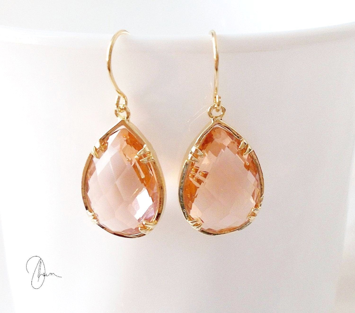 gold stud earrings in malabar