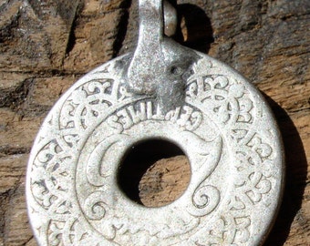 Tarnished Moroccan small coin 25 centimes with hole