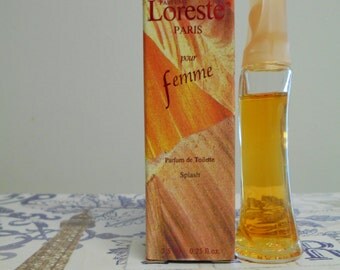 Loreste Pour Femme parfum de toilette splash. Miniature bottle, 7.5 ml / 0.25 fl. oz. with box. Loreste for Women by Parfums Loreste.