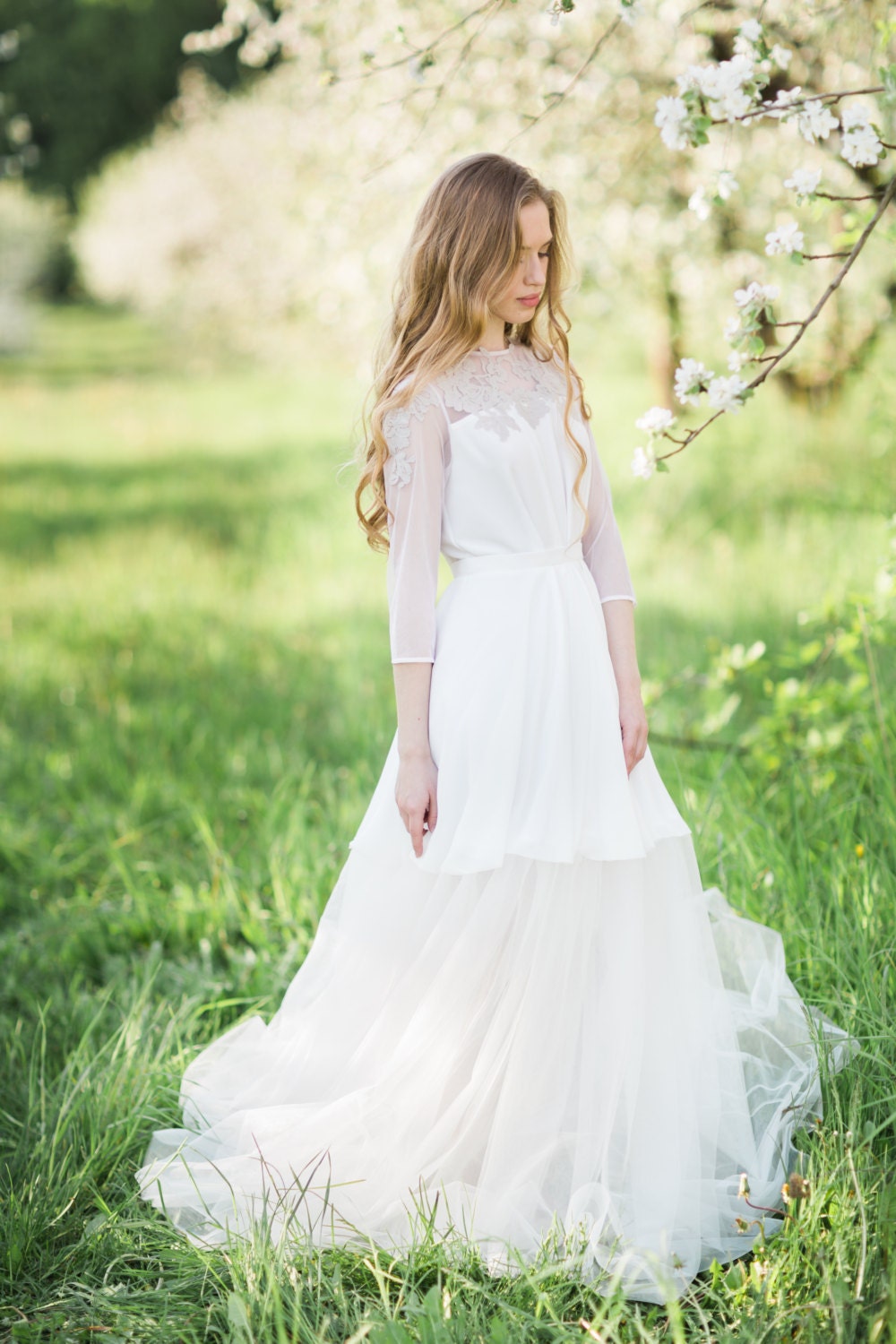 Milk dress with translucent skirt and lavender lace decoration