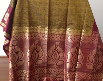 Assam silk saree with grey gold and coppery red Paisley design and separate design for pallu and folds