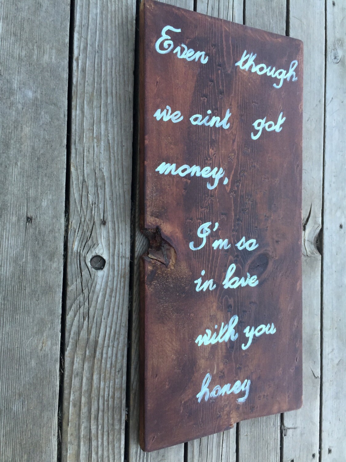 Even though we aint got money im so in love with you honey