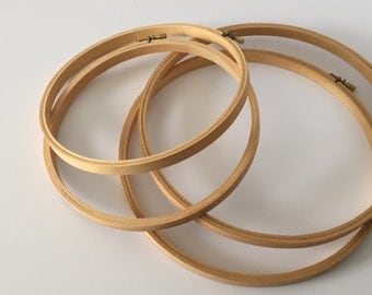 4 wooden embroidery hoops. 2 - 8" and 2 - 10"