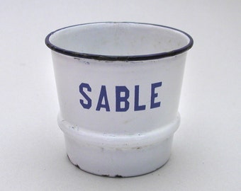 Small white and blue enamel pot