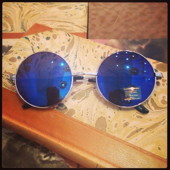 Retro sunglasses: Small round 60's John Lennon style blue mirror glass.