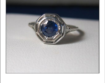 HOLDING --Antique Art deco 18k Sapphire Filigree Engagement Ring
