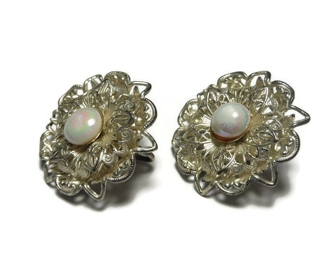 FREE SHIPPING Opalescent earrings, white pearly opalescent centers with petals of silver filigree grace these floral clip earrings