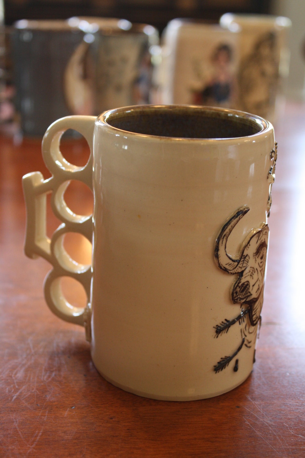 Unique Coffee Mug with Brass Knuckle Handle by InnocentLookingPots