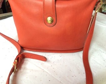 Bright red leather Coach purse