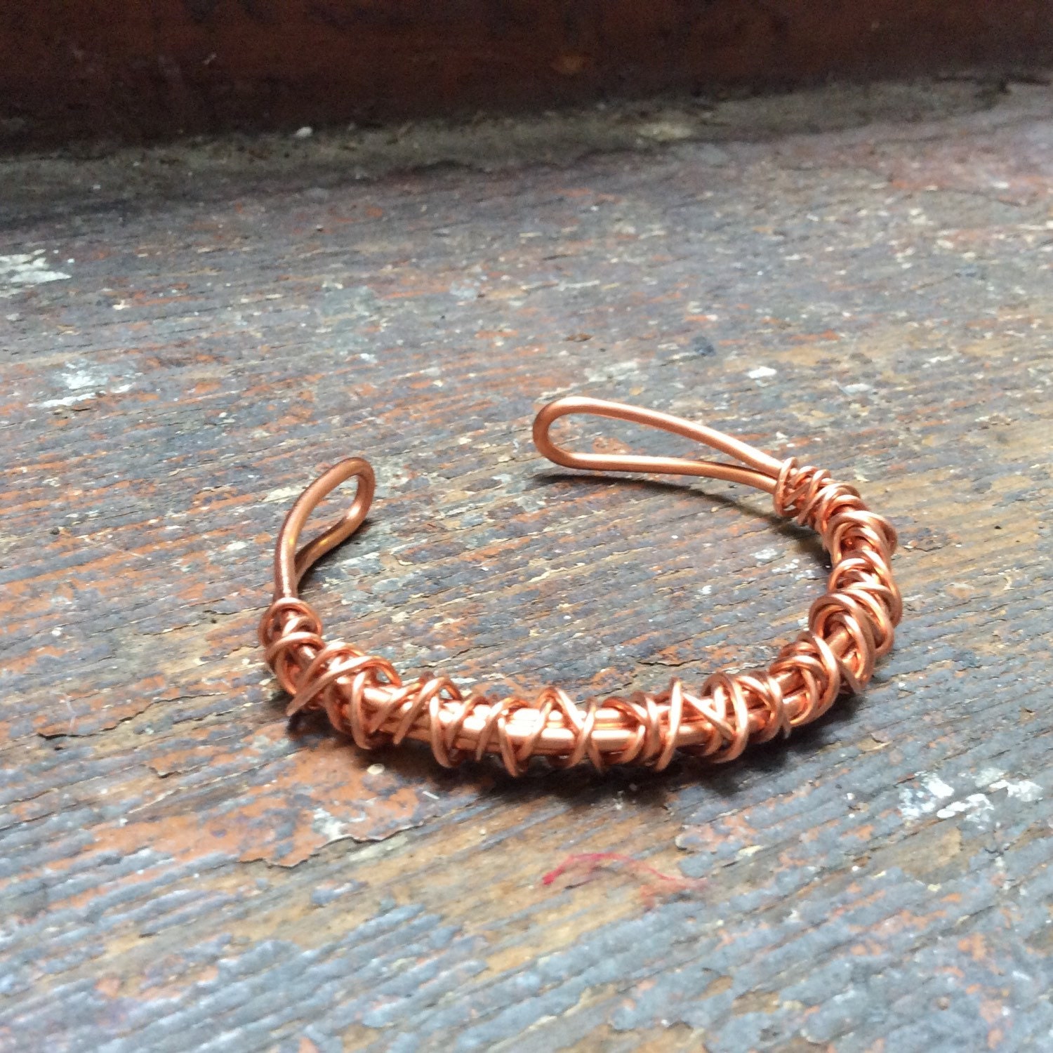 Mens Bracelet made with bare copper wire in a tangle design.