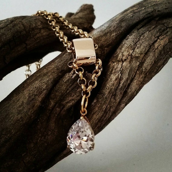 Items similar to Genuine Swarovski crystal on gold neck chain. on Etsy