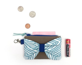 boxed mini wallet on a chain in signature canvas