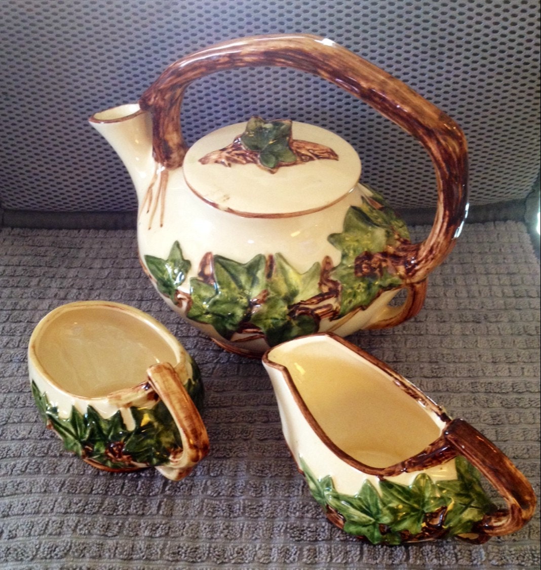 Vintage McCoy Teapot Creamer and Sugar with Ivy Decoration.