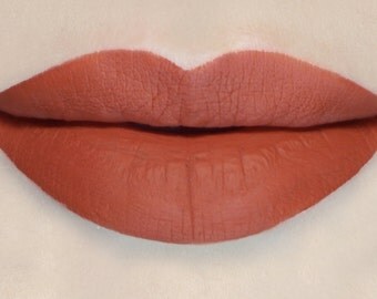 Burnout - Vegan Warm Neutral Red Matte Liquid Lipstick vegan vegan makeup vegan lipstick liquid lipstick potions cosmetics vegan brick red