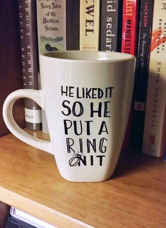 He liked it so he put a ring on it engagement quote by JitterMug