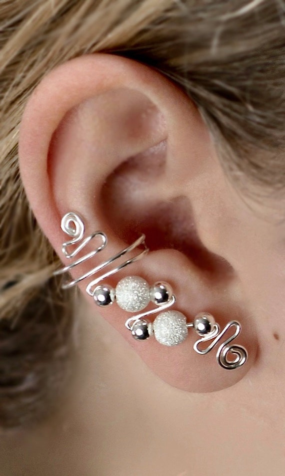 Ear Cuffs on the ear lobe with Shiny Sterling Silver and