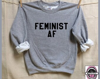FEMINIST AF. Unisex Heather Sweatshirts. Mens Womens Clothing. Activist. Feminism. Equality now. Femme. Badass feminist as f*ck. Humanism