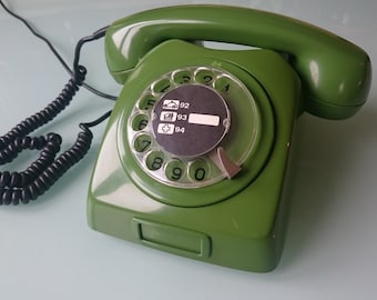 Vintage rotary phone, Yugoslavian communist phone, green old phone