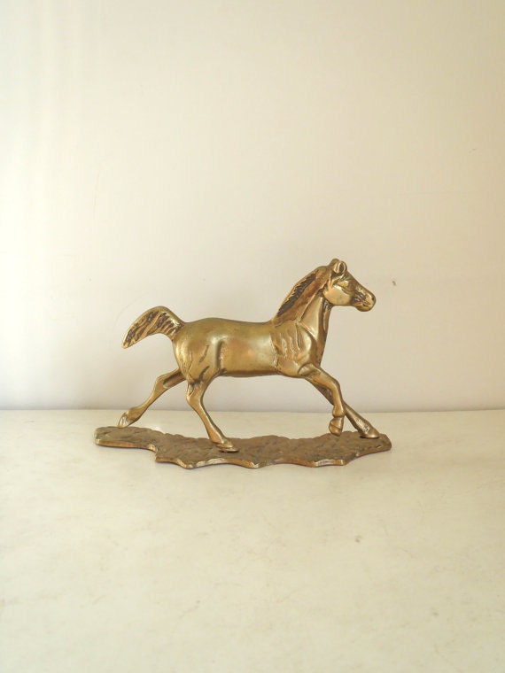 old metal horse figurines