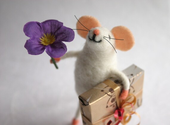 tiny mouse figurine