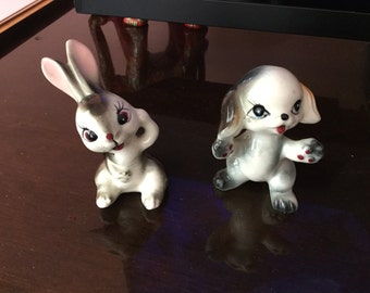 Two beautiful little figurines of a dog and rabbit