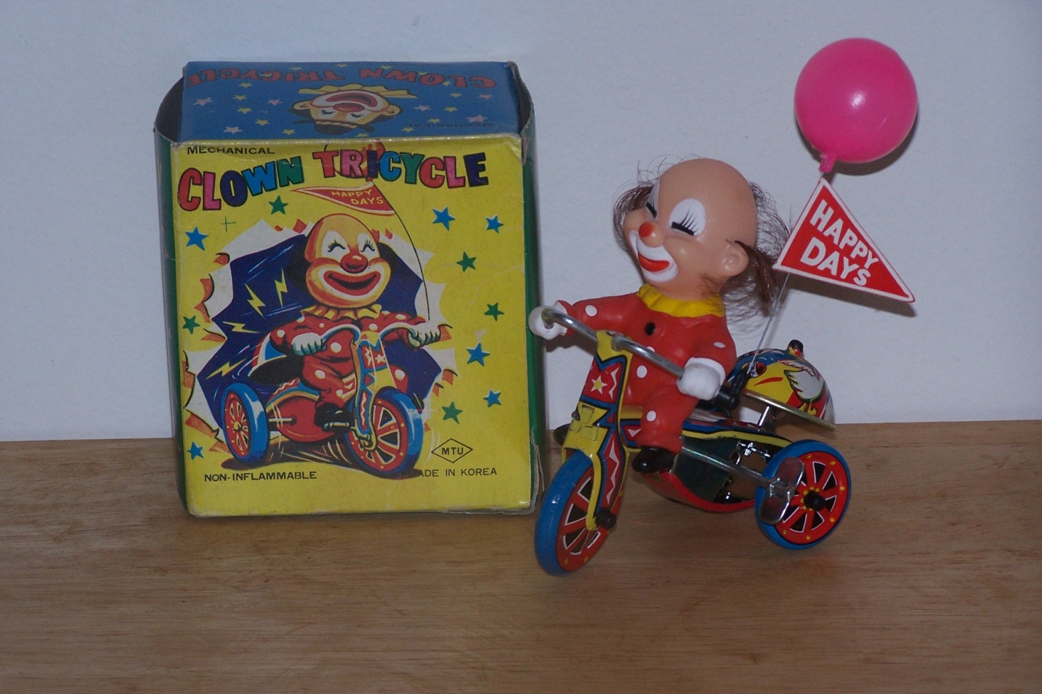 Tin WindUp Clown on Tricycle Korea