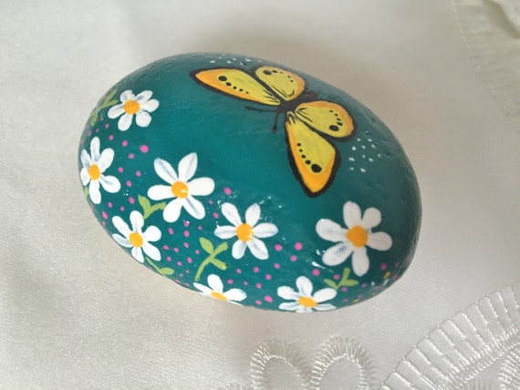 Yellow Butterfly And White Flowers On Teal Rockbutterflyrock