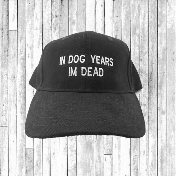 In Dog Years Im Dead Baseball Cap Embroidered Hat by FPPrinting