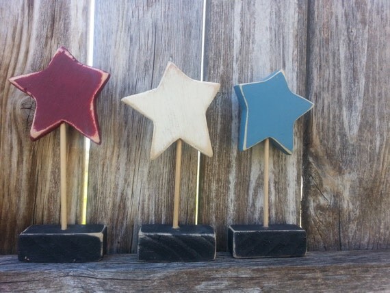 Set of three red, white and blue shelf sitter stars