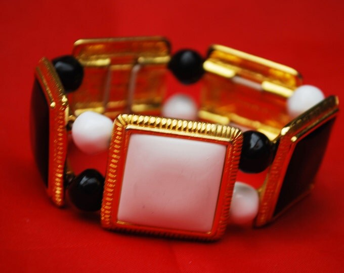 Liz Claiborne Stretch Bracelet with black and white gold panel andbeads