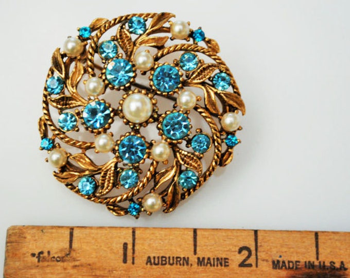 Blue Rhinestone and White Round Brooch Mid century gold floral Pin