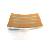 Yellow soap dish.