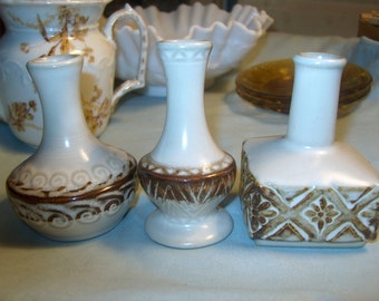 Vintage 1930s white glazed pottery vases relief design water