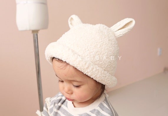 Create Your Etsy Account Urban Baby Bonnets feature unique, fun, funky baby bonnets for BOYS and GIRLS. Our innovative and reversible design makes these big-brimmed hats perfect for use with all kinds of baby carriers, provides discrete breastfeeding, and best of all, our adjustable snap closure means they’ll stay on! Designed and handmade in the USA.
