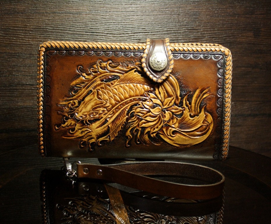 Hand-tooled leather travel wallet with koi and lotus pattern